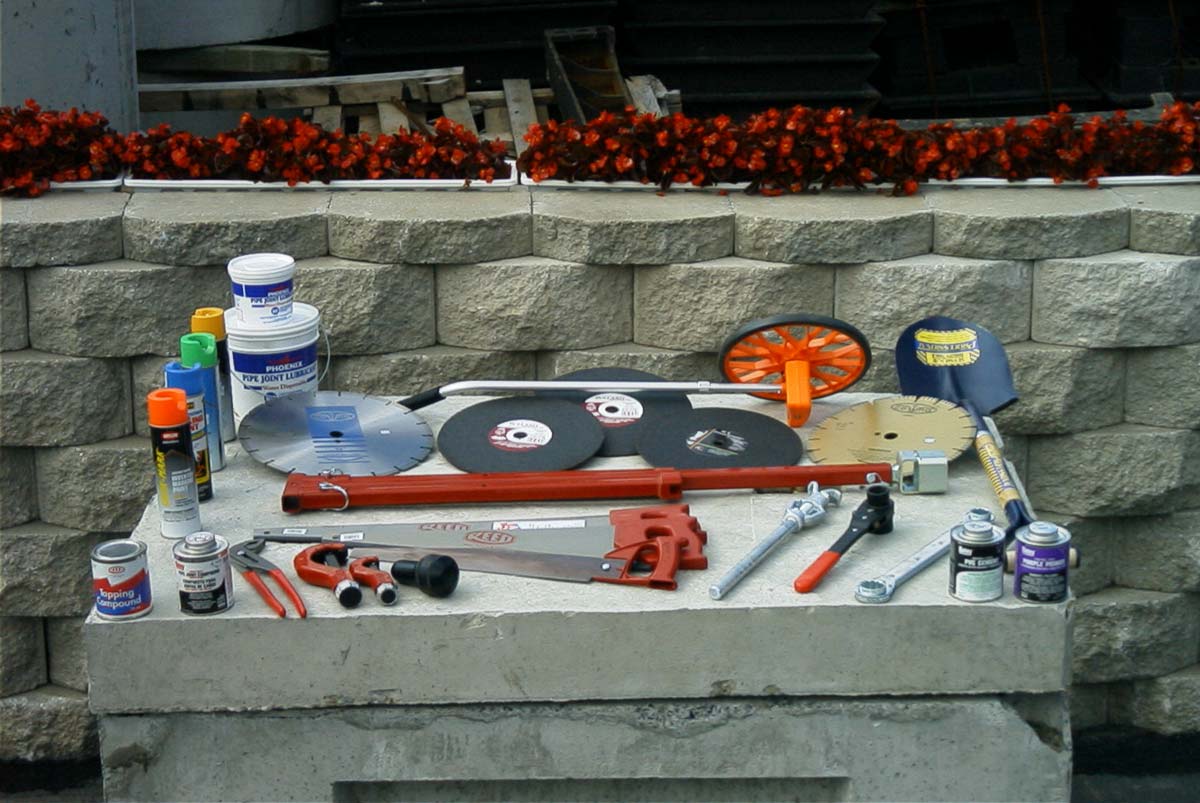 Abrasive Cutting Wheels|Copper Tubing Cutters|Diamond Tip Cutting Wheels|Hammer Flares|Hydrant Wrenches|Pipe Compound (Lube)|Tapping Compound|Water Main Wrenches|Pliers|PVC Cement|PVC Saws|Shovels|Ready-Measure Measuring Wheels|Upside-Down Marking Paint